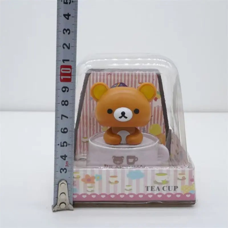 Solar Nodding Bear Figure